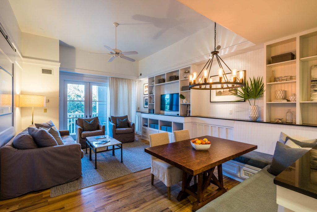 living space with dining area and living area in suite at watersound inn