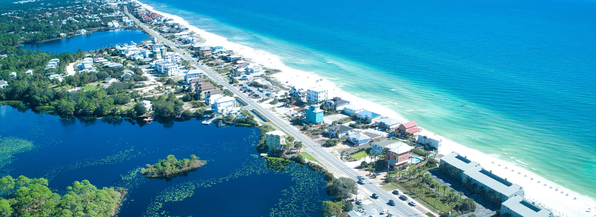 An aerial view of scenic beach-side highway 30A.
