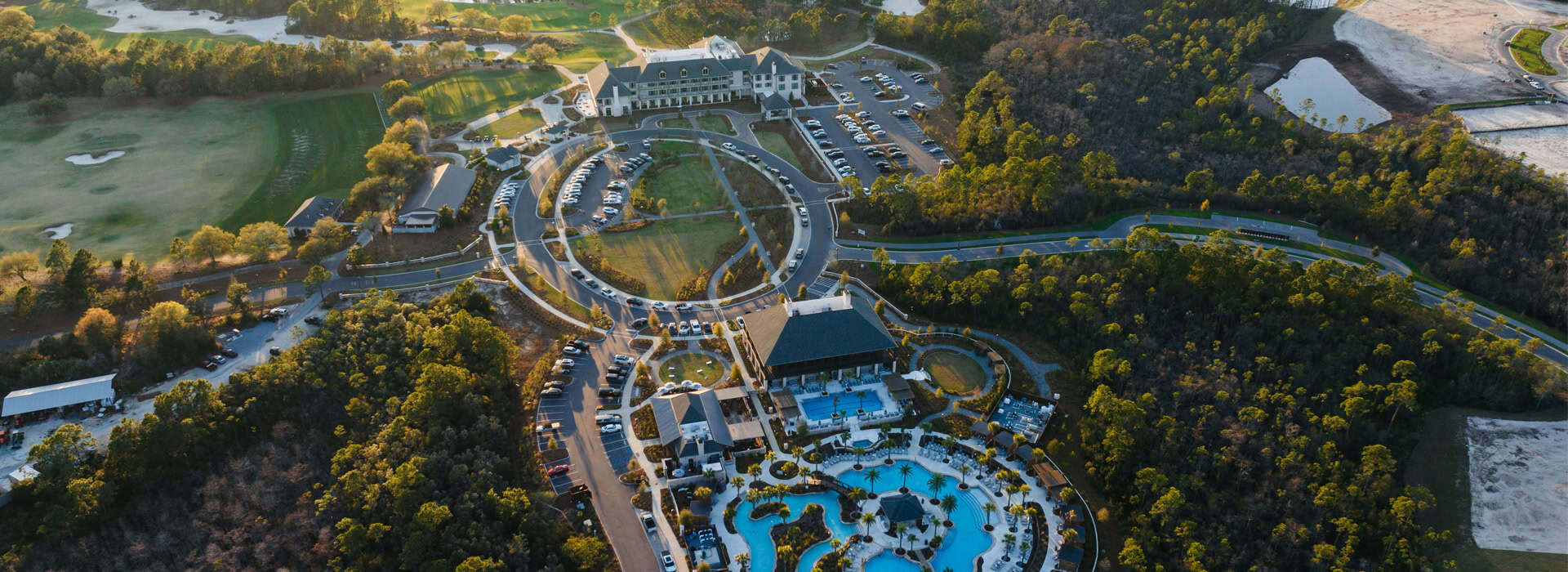Aerial view of Camp Creek Inn with extensive recreation activities.