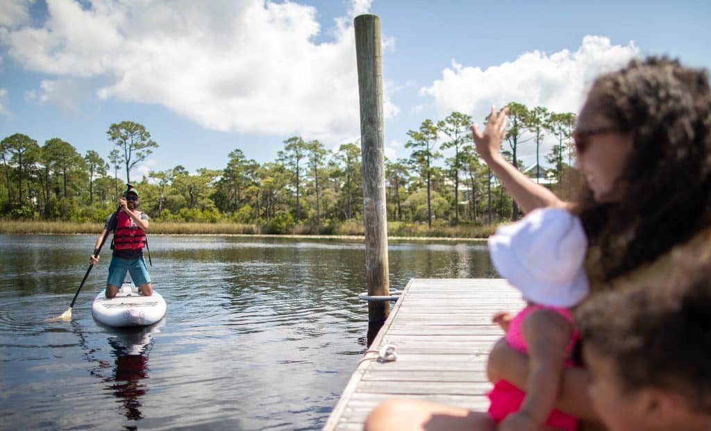 Paddleboarding on Western Lake, a coastal dune lake along Florida's Scenic Highway 30A