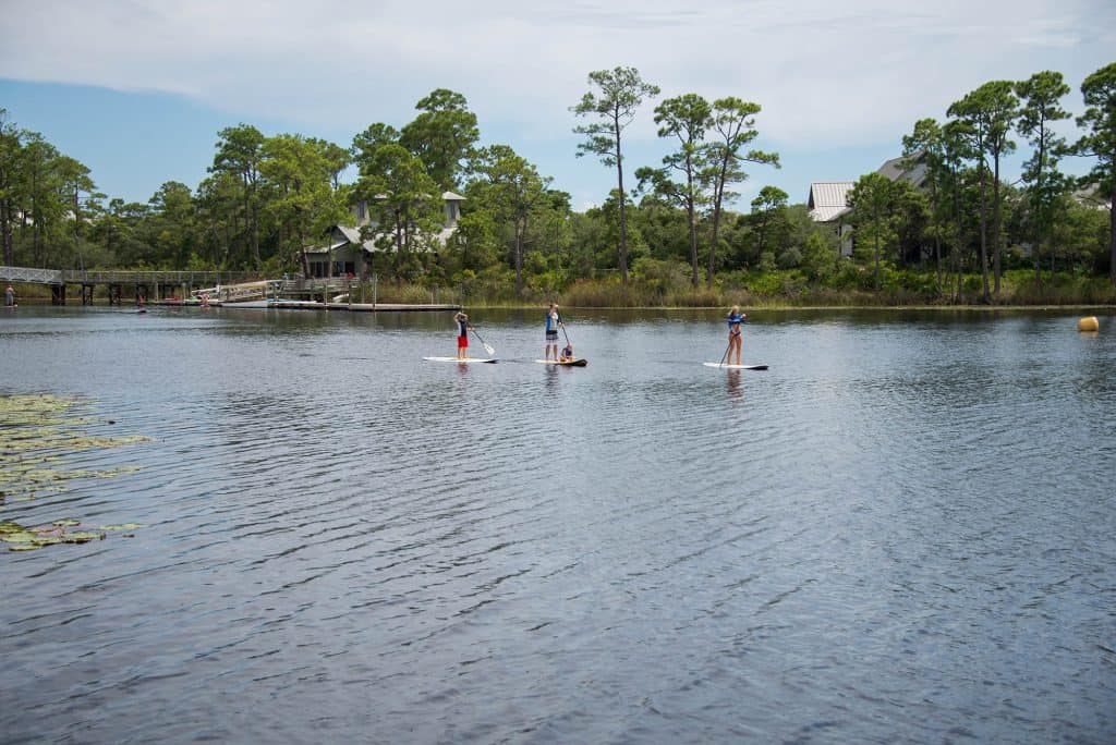 Stand-up paddleboarding on Western Lake, a coastal dune lake along Florida's Scenic Highway 30A