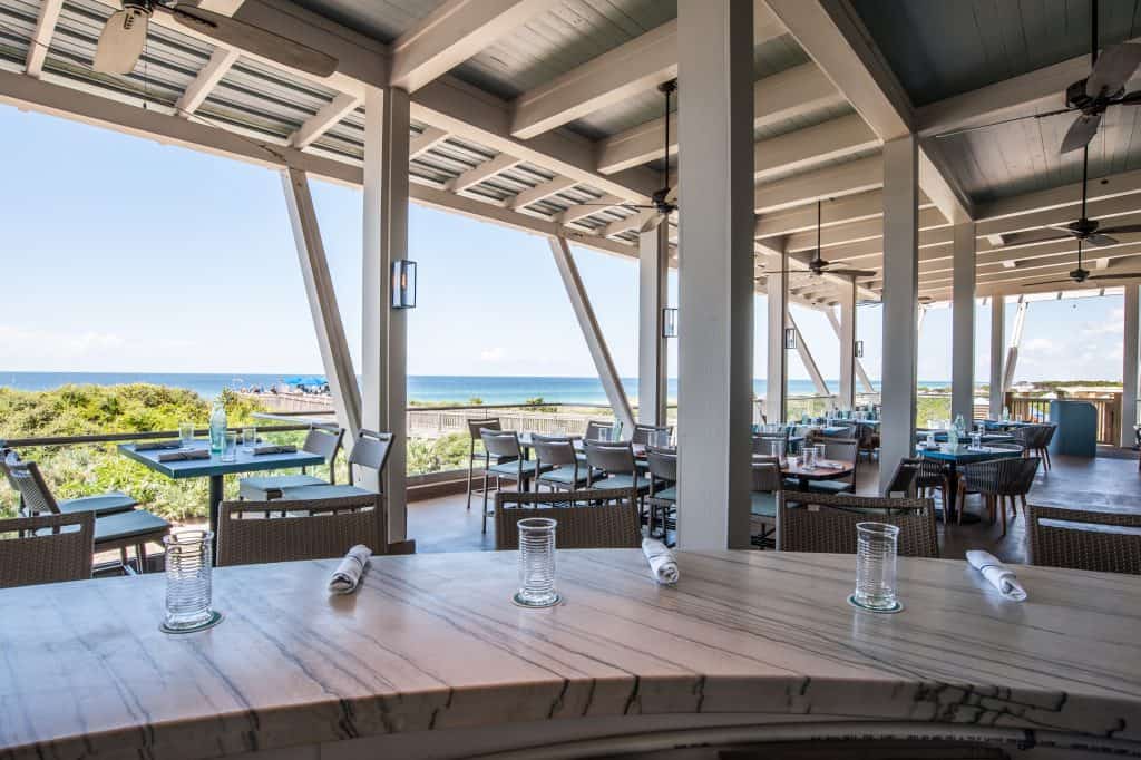 Outdoor dining with Gulf views at Fish Out of Water® Restaurant