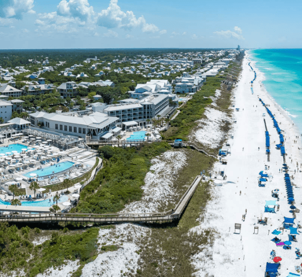 An aerial view of WaterColor Inn overlooking the Emerald Coast, heading toward Seaside.