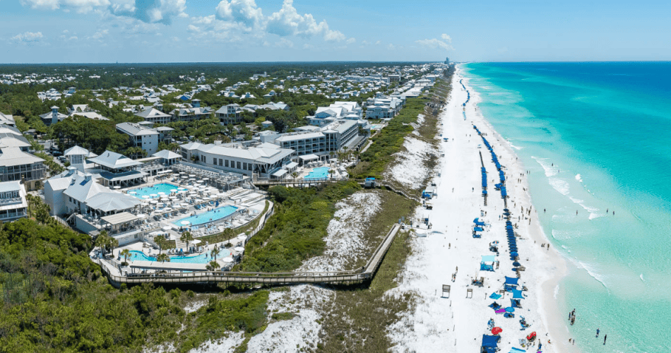 An aerial view of WaterColor Inn overlooking the Emerald Coast, heading toward Seaside.