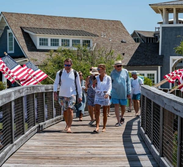 American flags on a wooden bridge at St. Joe Resort.